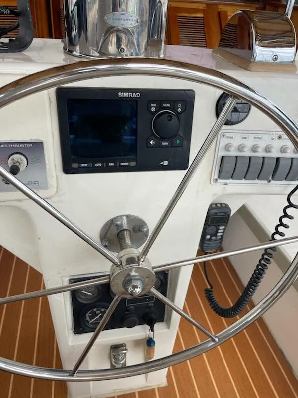 Slide: The Image of Seaton Custom Ketch 2014 helm with Simrad navigation system and stainless steel wheel. - 17