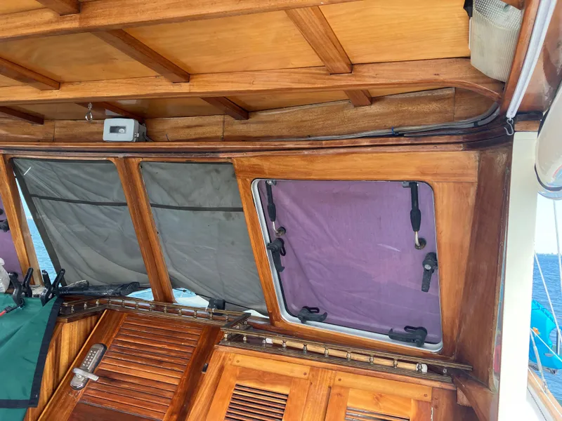 Slide: The Image of Wooden interior of 2014 Seaton Custom Ketch with windows and hatch. - 27