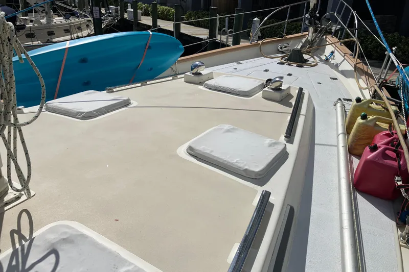 Slide: The Image of Deck of 2014 Seaton Custom Ketch with ropes and fuel containers. - 39