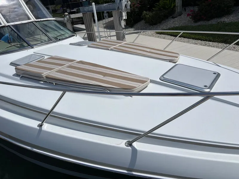 Slide: The Image of 2008 Formula 37 PC yacht with striped sun pads on deck. - 17