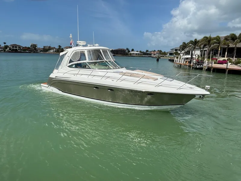 Slide: The Image of 2008 Formula 37 PC yacht cruising in a tropical bay with clear skies. - 2