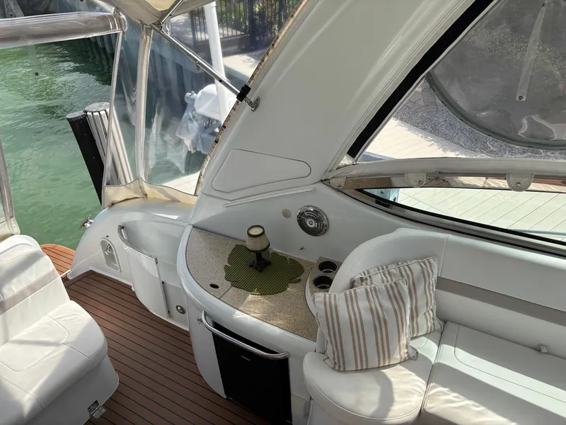 Slide: The Image of Interior of 2008 Formula 37 PC yacht with seating and kitchenette area. - 22