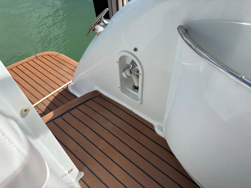 Slide: The Image of 2008 Formula 37 PC boat deck with teak flooring and stainless steel railing. - 23