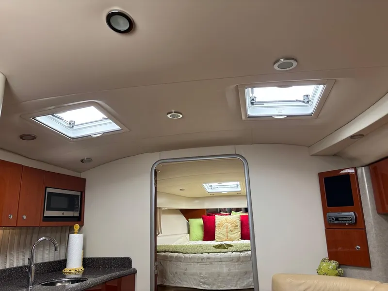 Slide: The Image of Interior of 2008 Formula 37 PC yacht with modern kitchen and cozy bedroom. - 28