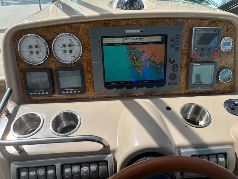 Slide: The Image of Dashboard of a 2008 Formula 37 PC boat with navigation system and gauges. - 34