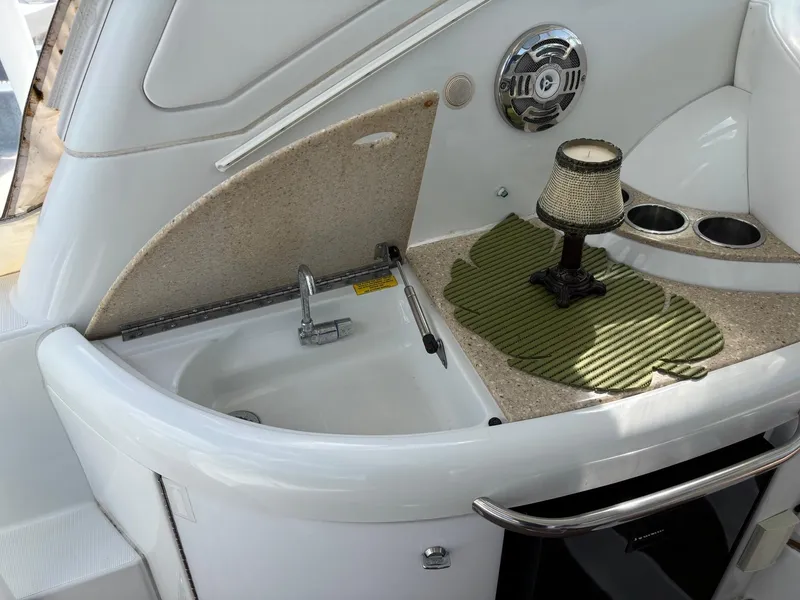 Slide: The Image of 2008 Formula 37 PC yacht interior with sink, countertop, and decorative lamp. - 40