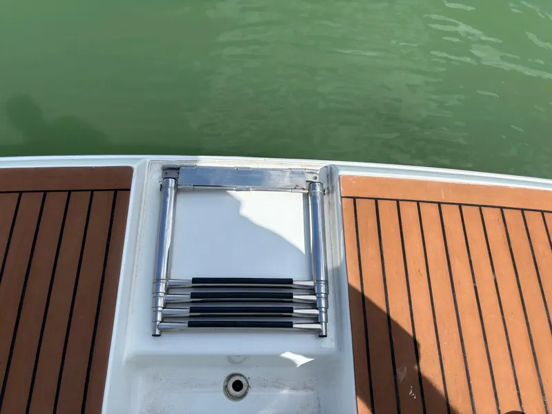 Slide: The Image of 2008 Formula 37 PC swim platform with retractable ladder and teak decking. - 41