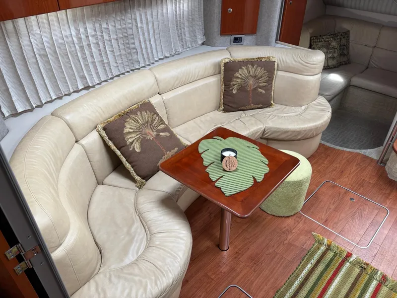 Slide: The Image of Luxurious interior of 2008 Formula 37 PC yacht with beige seating and decorative pillows. - 45