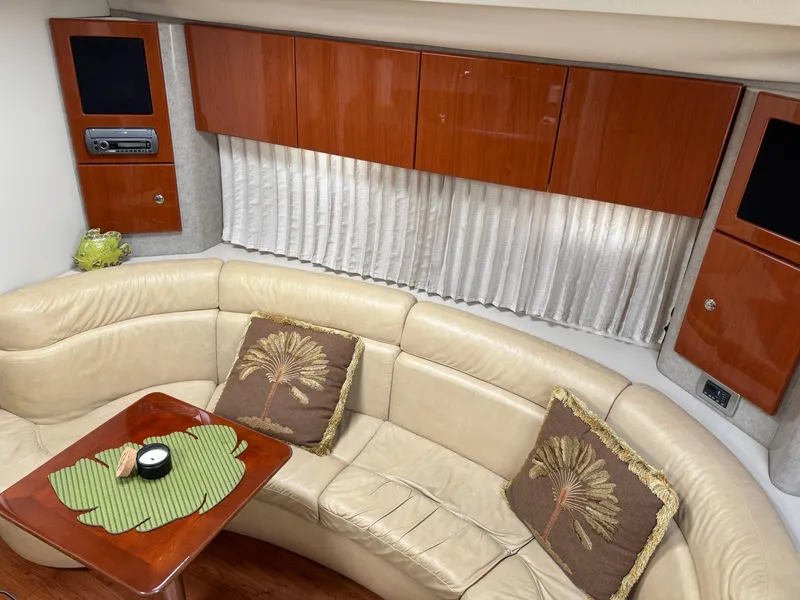 Slide: The Image of Luxurious interior of a 2008 Formula 37 PC yacht with leather seating and wood accents. - 46