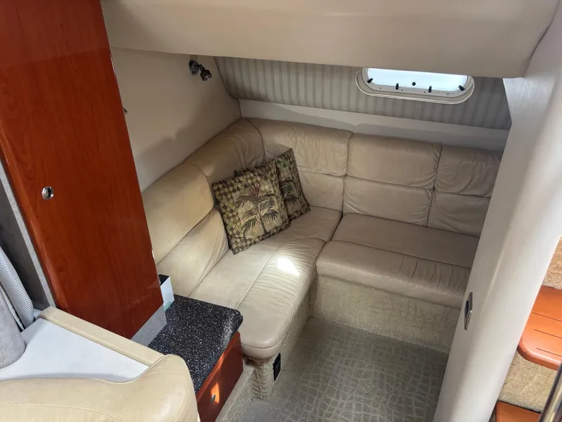 Slide: The Image of 2008 Formula 37 PC yacht interior with beige leather seating and decorative pillows. - 47