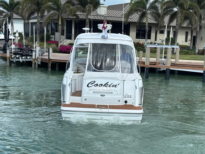 Slide: The Image of 2008 Formula 37 PC boat docked near palm trees in Marco Island, FL. - 5