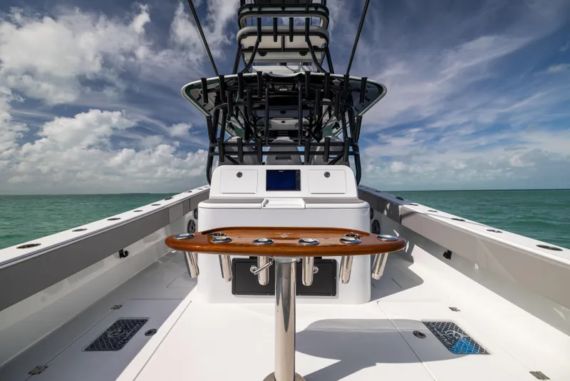 Slide: The Image of 2024 Freeman 42 LR boat deck with ocean view and clear sky. - 26