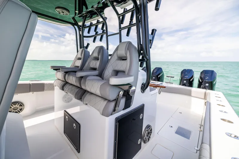 Slide: The Image of 2024 Freeman 42 LR boat interior with luxury seating and ocean view. - 33