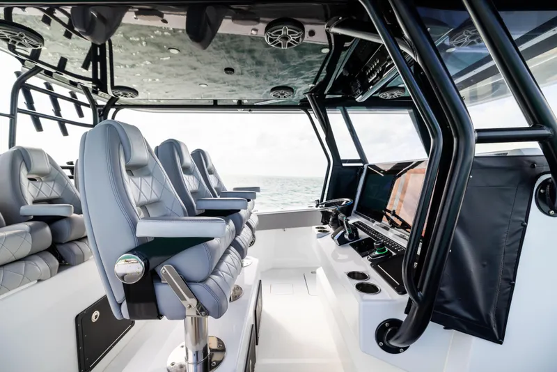 Slide: The Image of 2024 Freeman 42 LR boat interior with modern seating and navigation equipment. - 34