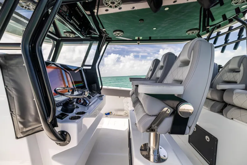 Slide: The Image of 2024 Freeman 42 LR boat interior with modern helm and luxurious seating. - 35