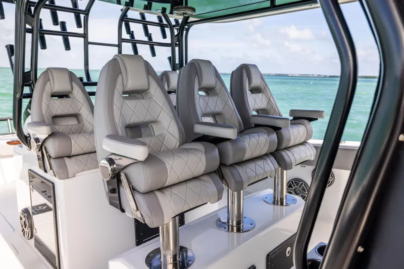 Slide: The Image of Luxury seating on 2024 Freeman 42 LR boat with ocean view. - 36
