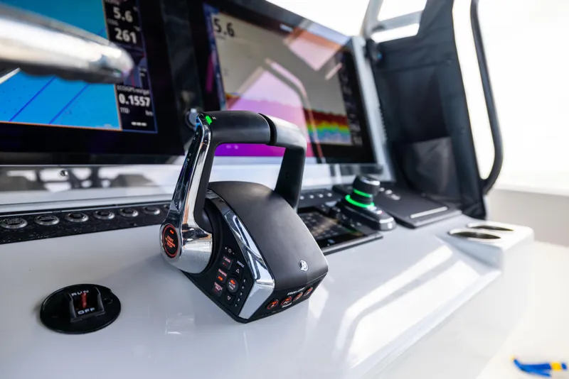 Slide: The Image of Control panel of 2024 Freeman 42 LR boat with advanced navigation displays. - 39