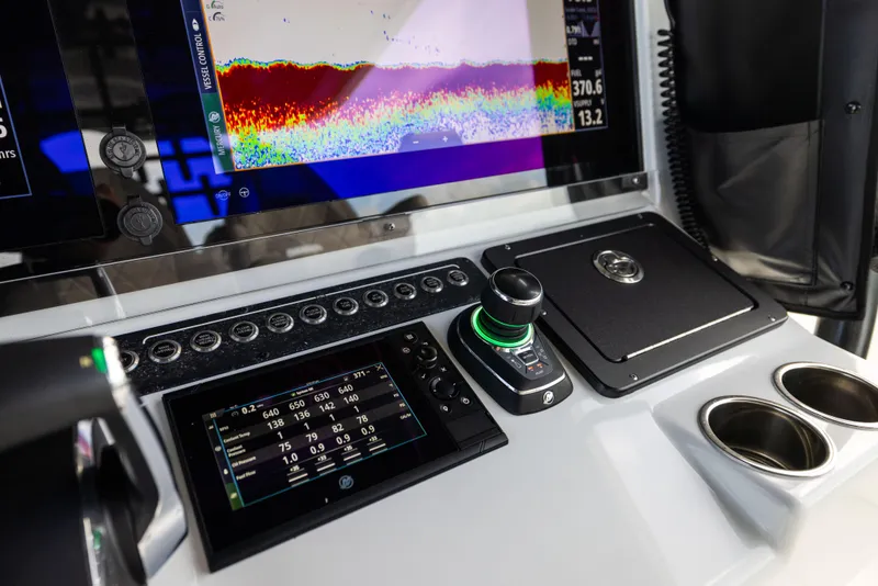 Slide: The Image of Control panel of 2024 Freeman 42 LR boat with advanced navigation displays. - 40