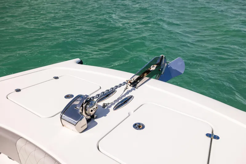 Slide: The Image of 2024 Freeman 42 LR boat anchor system on turquoise water. - 48