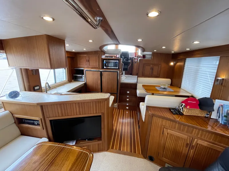 Slide: The Image of Luxurious interior of 2009 American Tug 49 Limited with wood finishes and modern amenities. - 3