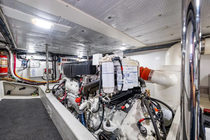 Slide: The Image of Engine room of 2009 American Tug 49 Limited, showcasing machinery and equipment. - 41