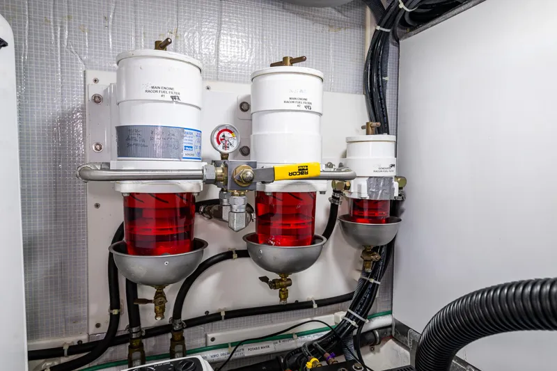 Slide: The Image of Engine room fuel filters in a 2009 American Tug 49 Limited boat. - 45