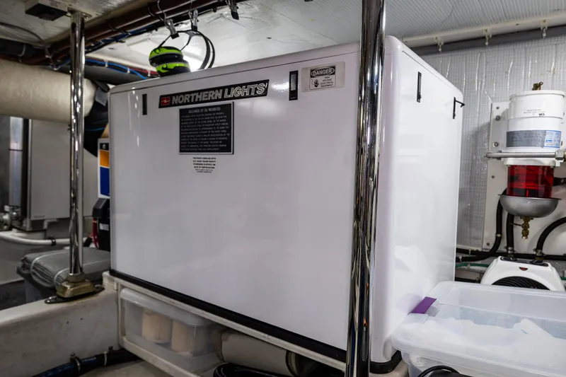 Slide: The Image of Engine room of 2009 American Tug 49 Limited with Northern Lights generator. - 47