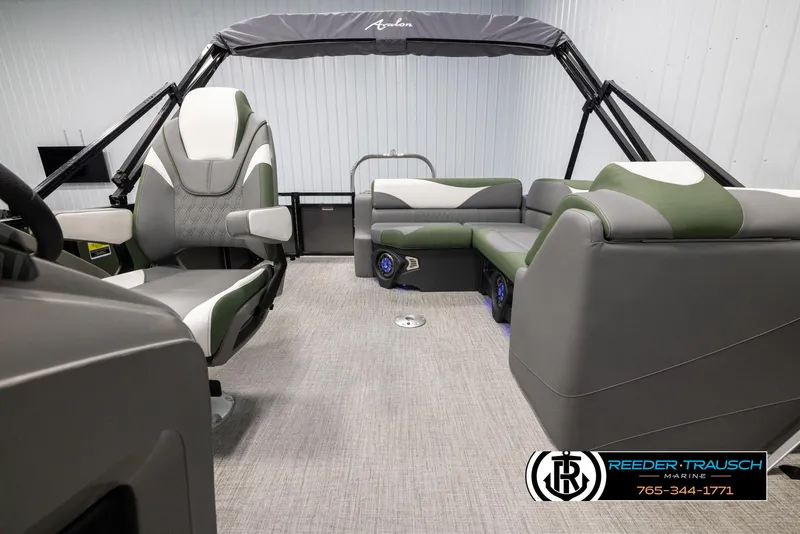 Slide: The Image of 2025 Avalon LSZ CRB boat interior with modern seating and canopy. - 14
