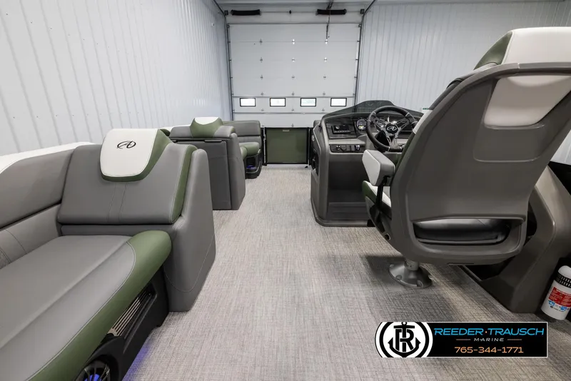 Slide: The Image of Interior of 2025 Avalon LSZ CRB boat with modern seating and steering console. - 17