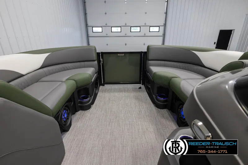 Slide: The Image of Interior of 2025 Avalon LSZ CRB pontoon boat with plush seating and modern design. - 18