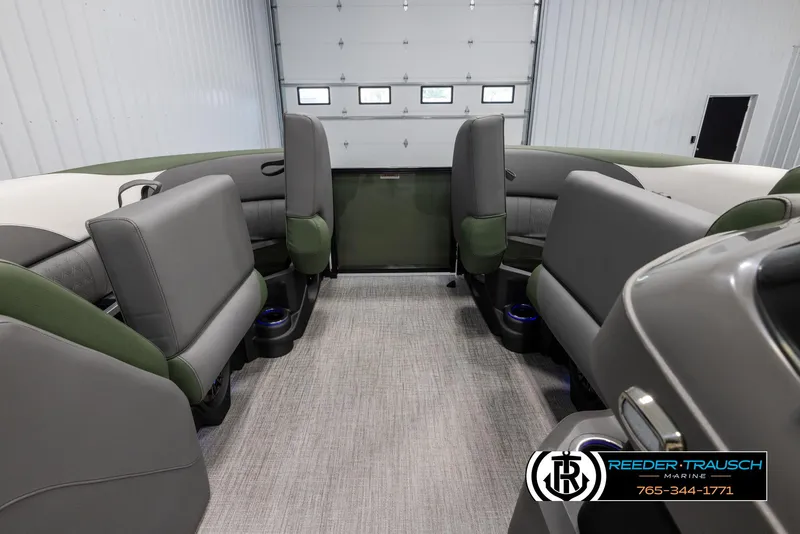 Slide: The Image of Interior of 2025 Avalon LSZ CRB boat with gray and green seating. - 19