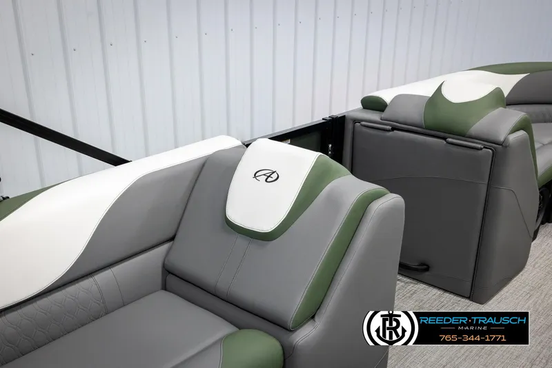 Slide: The Image of 2025 Avalon LSZ CRB boat seats with green and gray upholstery, featuring a logo. - 25