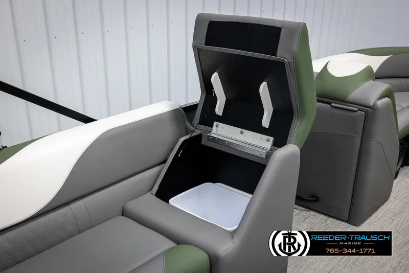 Slide: The Image of 2025 Avalon LSZ CRB boat seat with storage compartment, featuring gray and green upholstery. - 26