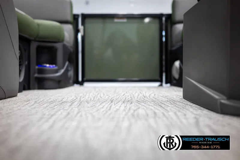 Slide: The Image of Interior view of 2025 Avalon LSZ CRB boat, featuring modern seating and flooring. - 41