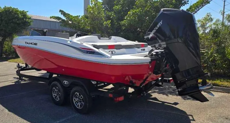 Slide: The Image of 2025 Tahoe T21 boat with Mercury outboard engine on a trailer. - 9