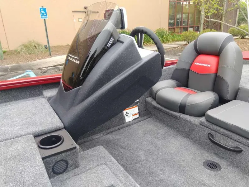 Slide: The Image of 2025 Tracker Pro Team 190 boat interior with steering console and seating. - 10