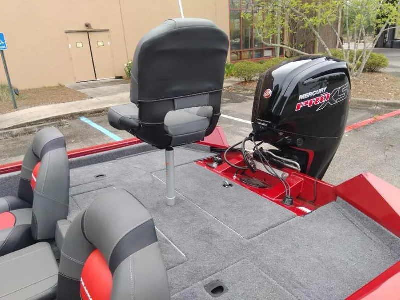 Slide: The Image of 2025 Tracker Pro Team 190 boat with Mercury Pro XS engine, featuring comfortable seating. - 13