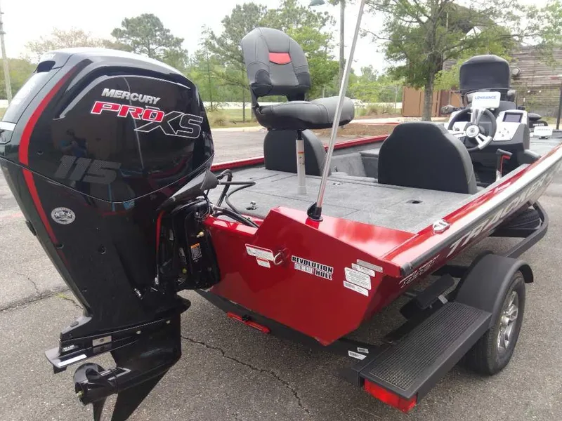 Slide: The Image of 2025 Tracker Pro Team 190 boat with Mercury Pro XS engine, parked outdoors. - 3