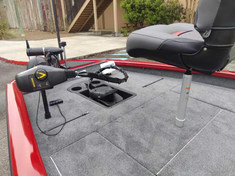 Slide: The Image of 2025 Tracker Pro Team 190 boat deck with seat and trolling motor. - 8