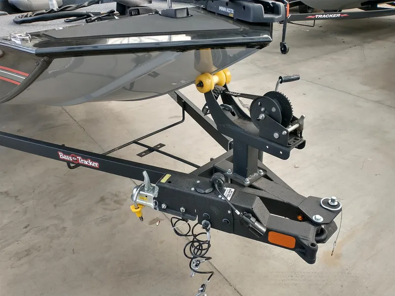 Slide: The Image of 2025 Tracker Bass Tracker Classic XL boat on trailer in parking lot. - 18