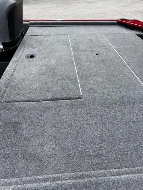 Slide: The Image of 2025 Tracker Bass Tracker Classic XL boat deck with gray carpeting. - 10