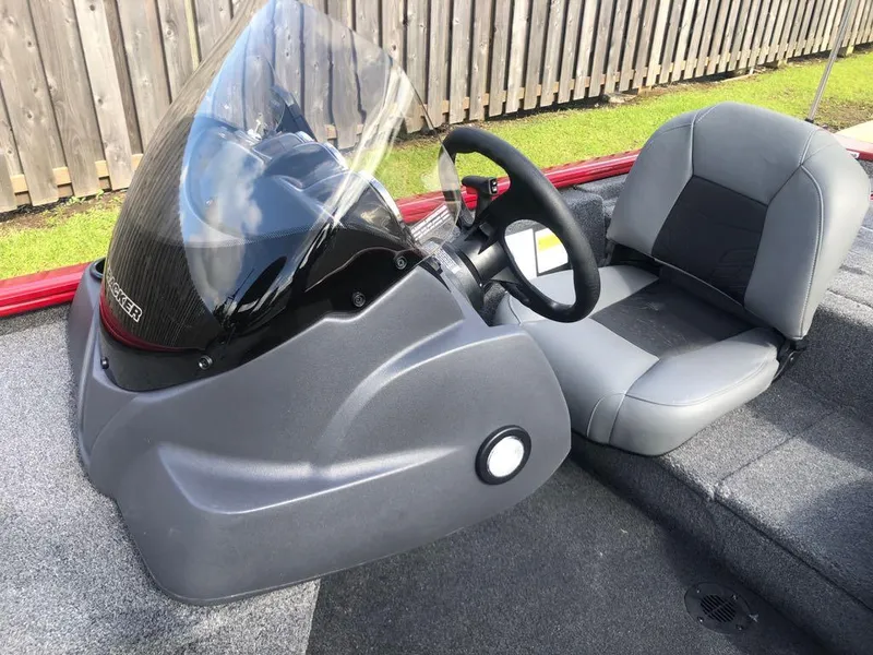 Slide: The Image of 2025 Tracker Pro 170 boat interior with steering wheel and seating. - 8