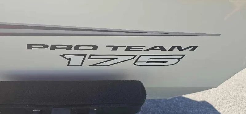 Slide: The Image of 2025 Tracker Pro Team 175 boat logo on a sleek surface. - 2