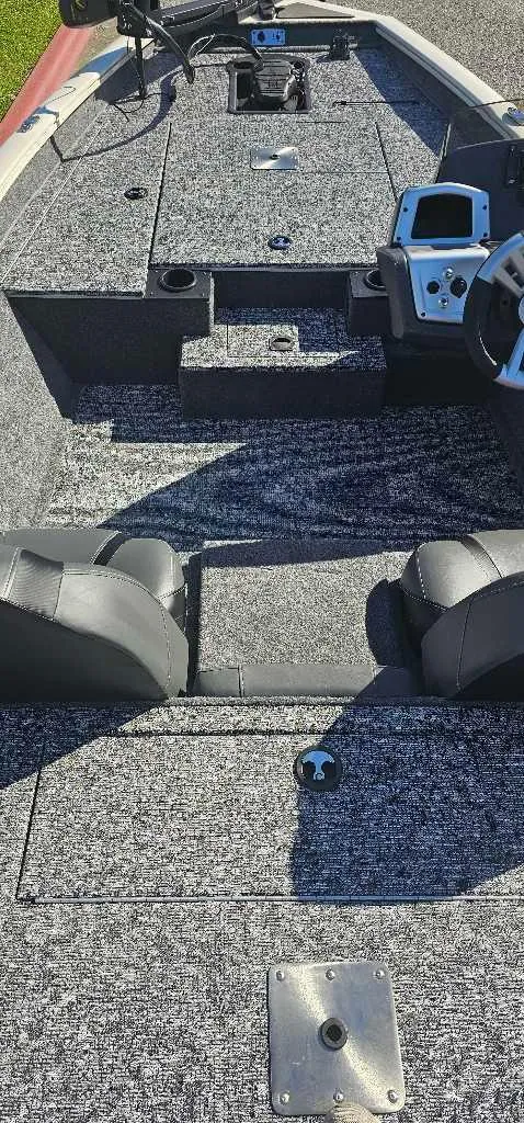 Slide: The Image of 2025 Tracker Pro Team 175 boat interior with seating and control panel. - 3