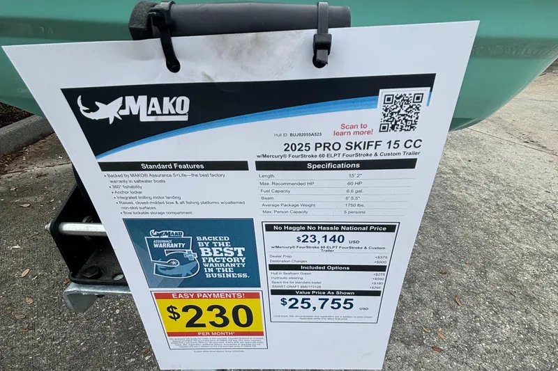 Slide: The Image of 2025 Mako Pro Skiff 15 CC specifications and pricing sheet displayed outdoors. - 5