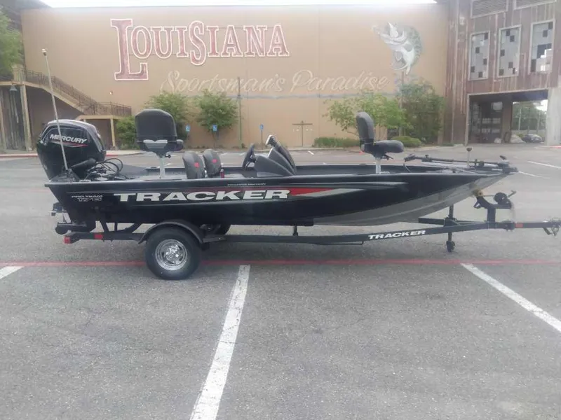 Slide: The Image of 2025 Tracker Pro Team 175 boat parked in front of Louisiana Sportsman's Paradise. - 6