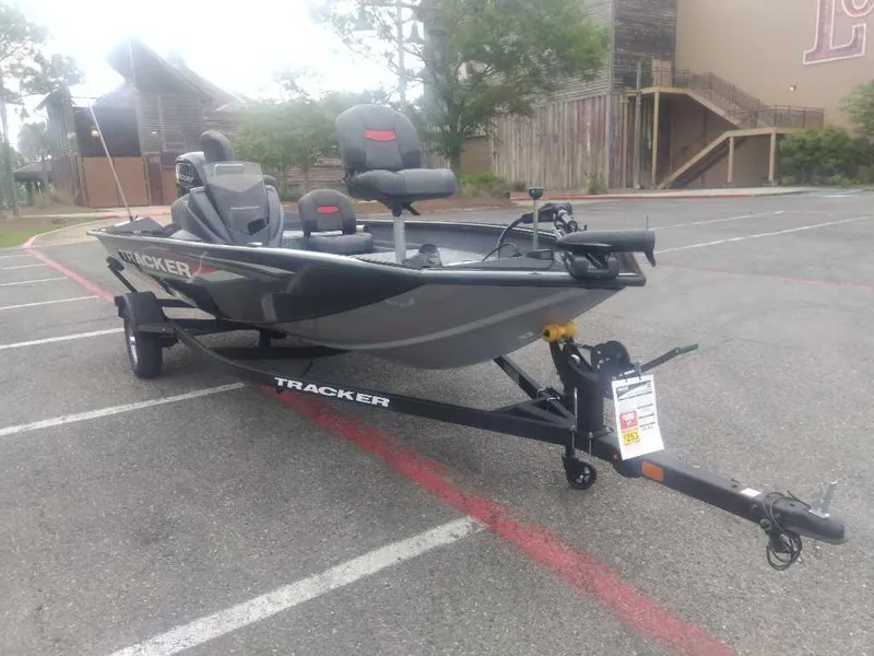 Slide: The Image of 2025 Tracker Pro Team 175 boat on trailer in parking lot. - 7