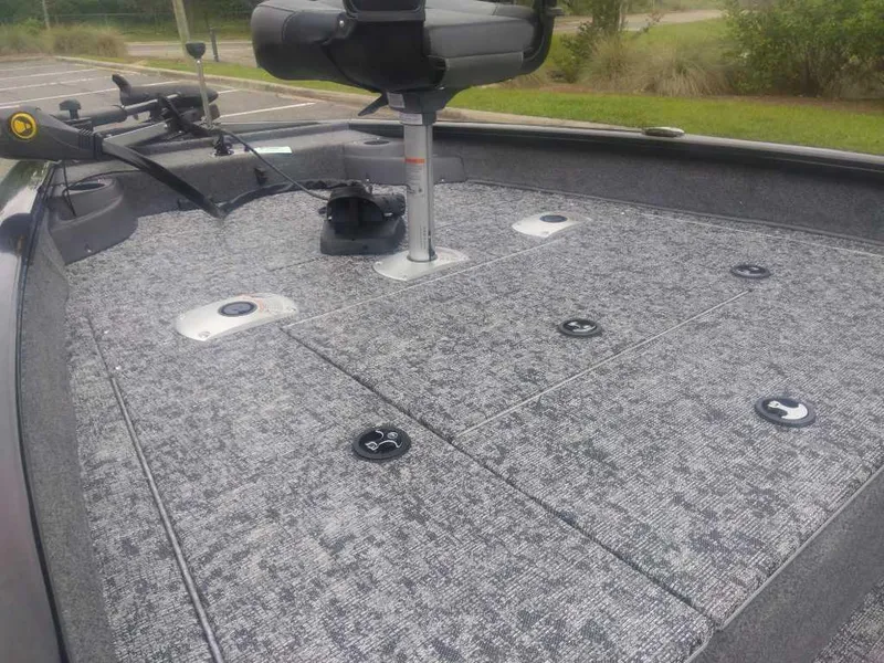 Slide: The Image of 2025 Tracker Pro Team 175 boat deck with seating and storage compartments. - 9