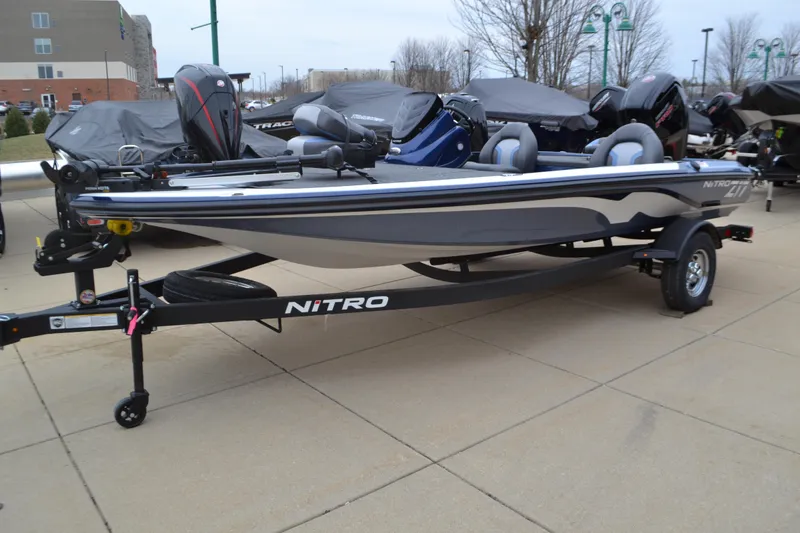 The Image of 2025 Nitro Z17 boat on trailer, parked outdoors. - 0