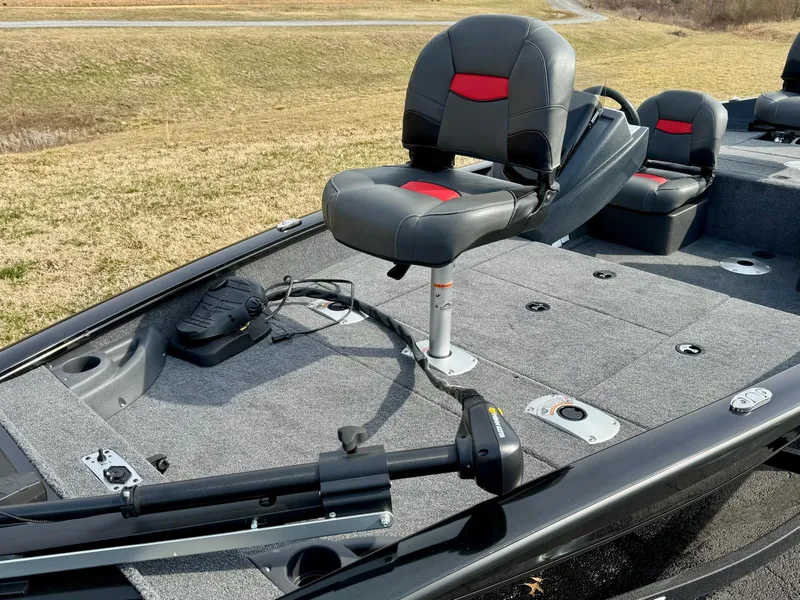 Slide: The Image of 2025 Tracker Pro Team 175 Crappie Edition fishing boat with swivel seat and trolling motor. - 7